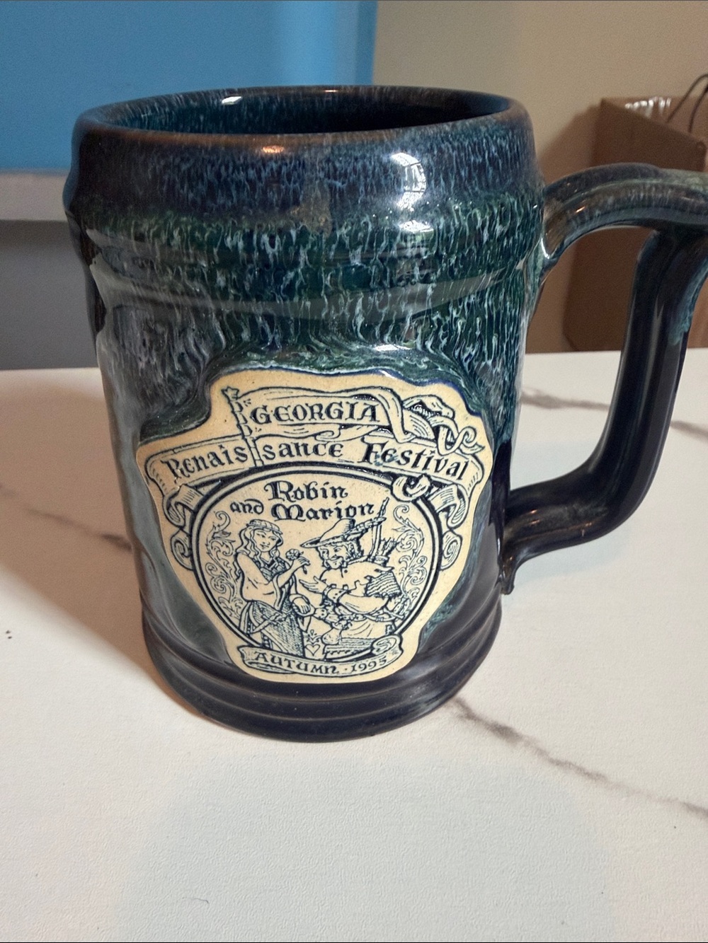 Georgia Renaissance Festival Blue-Green‎ Ceramic Mug - Robin and Marion Design